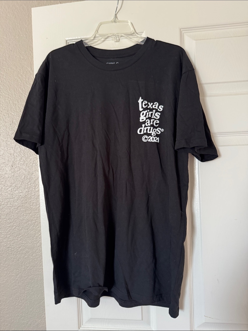 Black Short-Sleeve Graphic Tee with White Chest Print